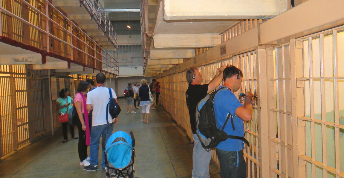 Visitors walk in the cell blocks at Alcatraz Federal Prison on Alcatraz Island San Francisco CA